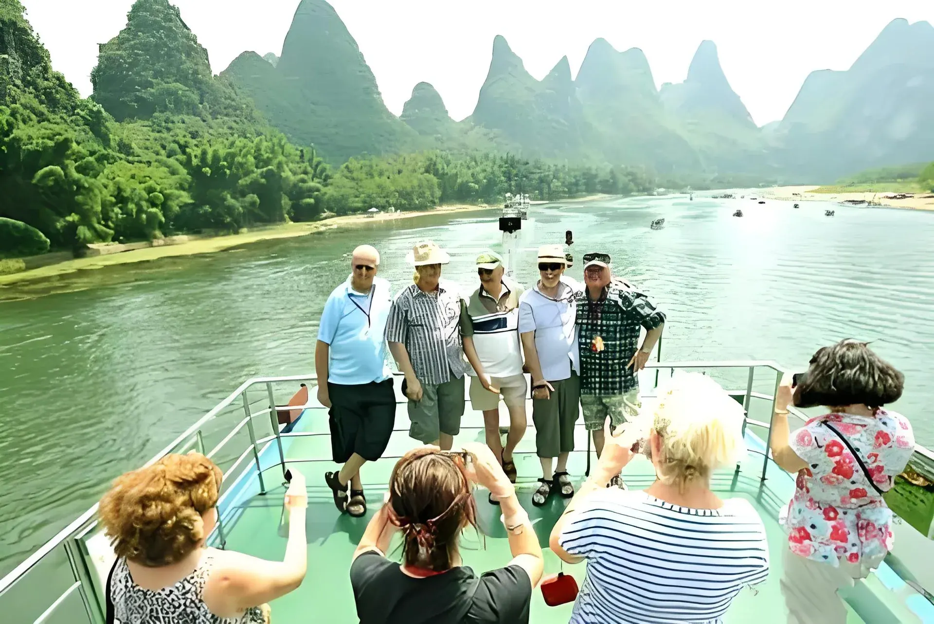 Visitors taking a bamboo raft journey