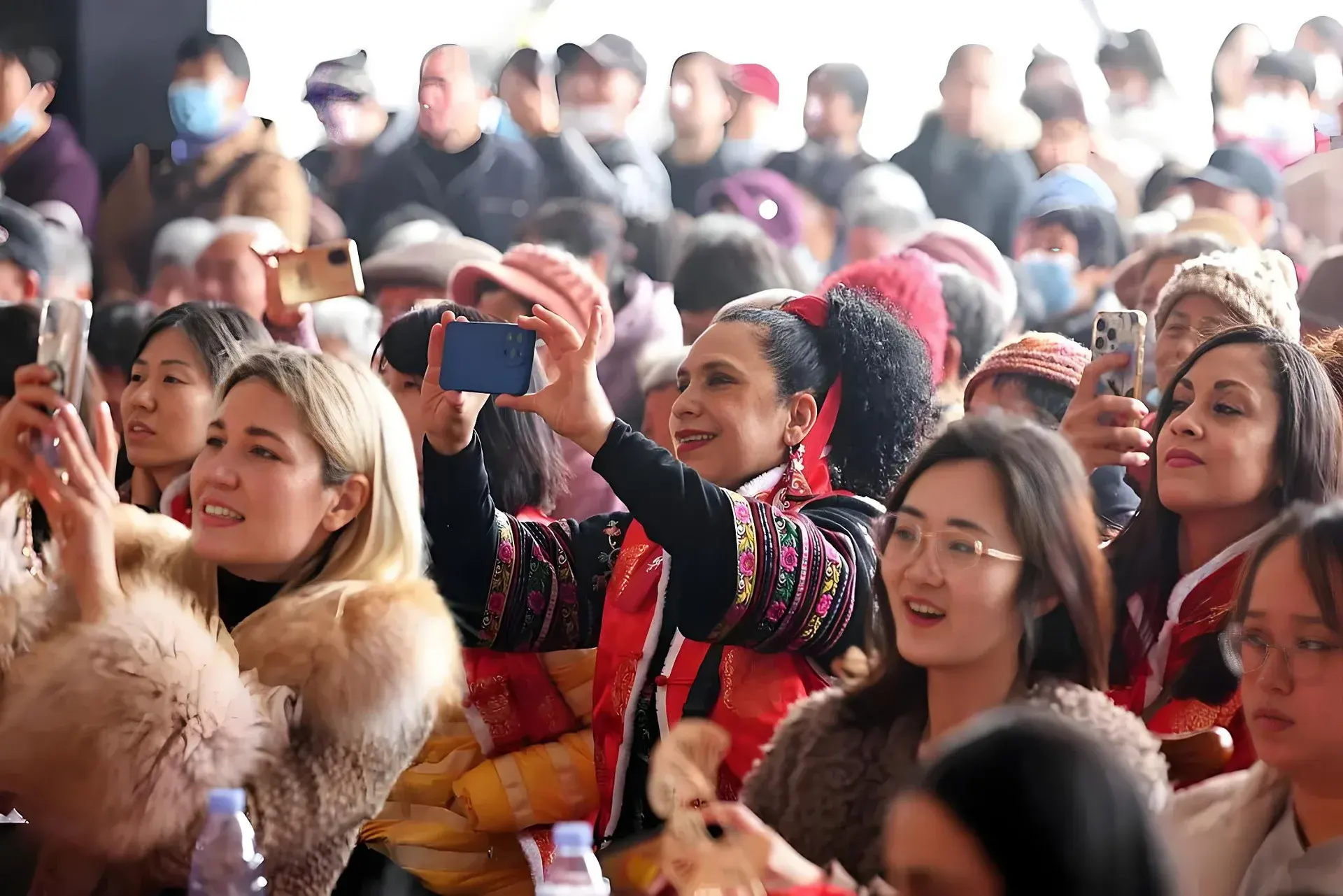 Travellers celebrating at a local event